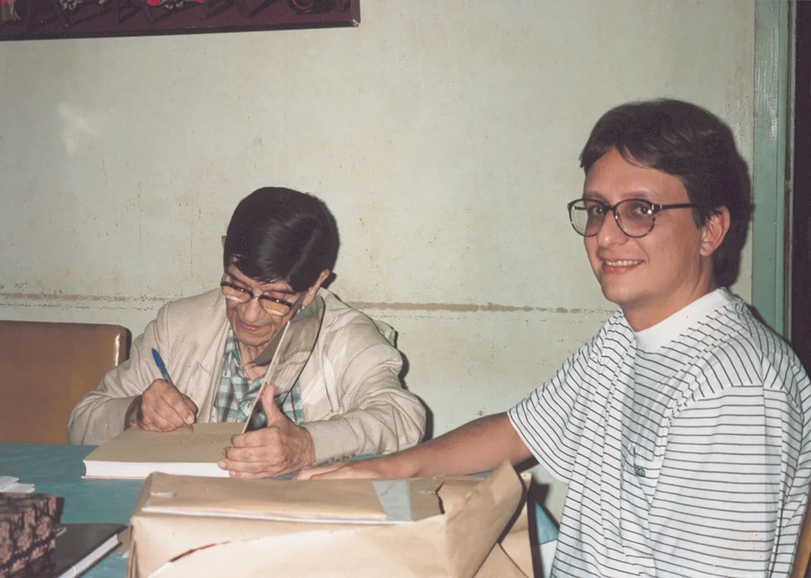 Chico Xavier e Geraldo Lemos Neto à mesa